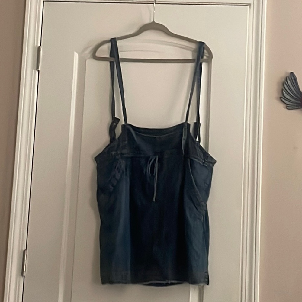 Super Cute, very soft linen like denim overall skirt with pockets.